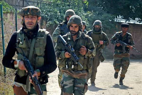 One Pakistani smuggler killed by security forces in Punjab, arms and drugs seized