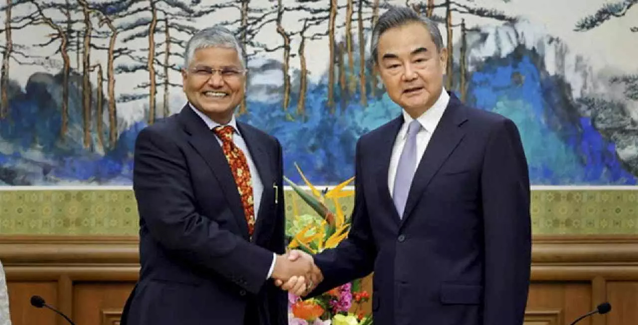Indian envoy Rawat meets Chinese FM Wang ahead of BRICS summit; stresses ‘criticality’ of peace at borders